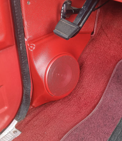 Kick panel speaker pods
