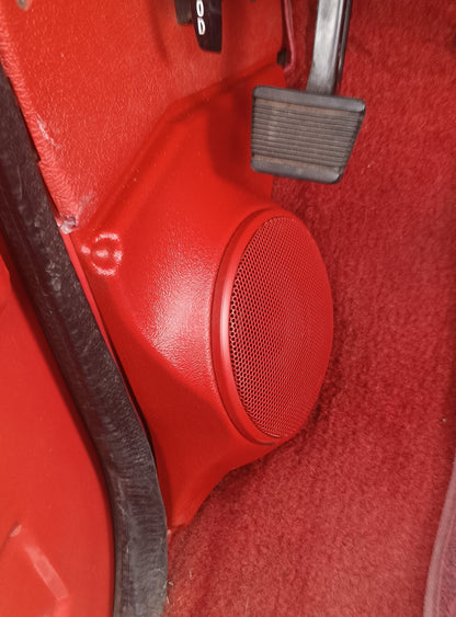 Kick panel speaker pods